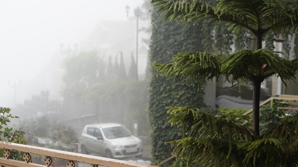 Resort terrace overlooking mist-covered valleys
