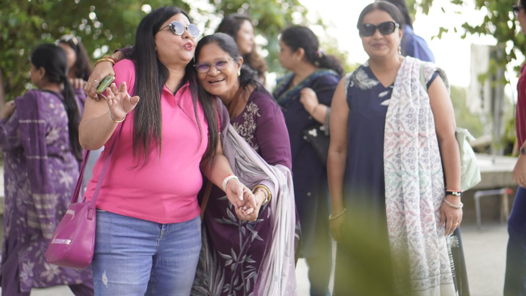 Guests walking together, arm in arm, on retreat