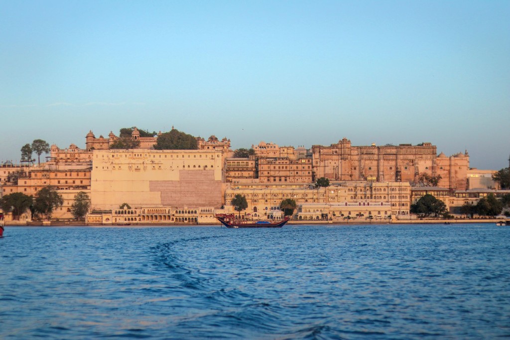 The Royal Retreat: Udaipur & Mount Abu - golden sunset on Lake Pichola with white heritage palaces and Aravalli hills